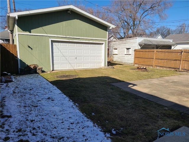 garage with fence