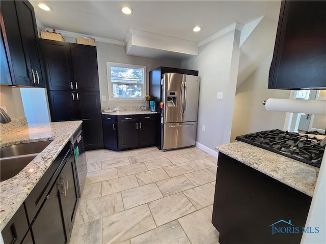 kitchen featuring crown molding, light stone countertops, stainless steel fridge with ice dispenser, dishwashing machine, and a sink