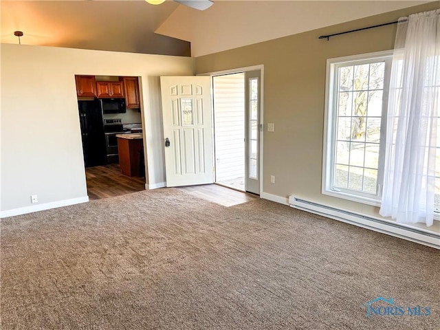 unfurnished living room with baseboard heating, dark carpet, and baseboards