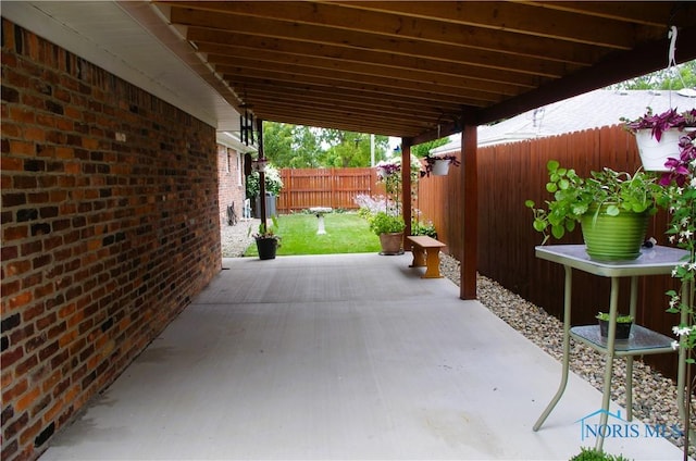 view of patio / terrace with fence