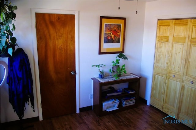 bedroom with wood finished floors