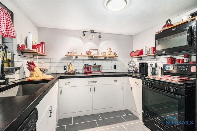 kitchen with white cabinetry, open shelves, tasteful backsplash, and black appliances