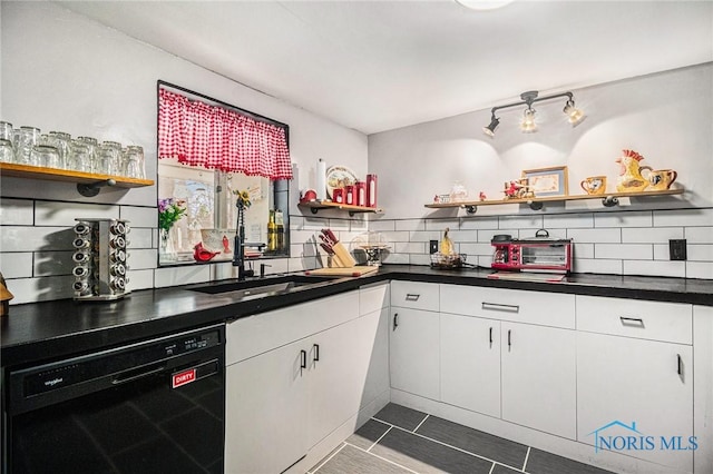 kitchen with open shelves, white cabinets, black dishwasher, and backsplash