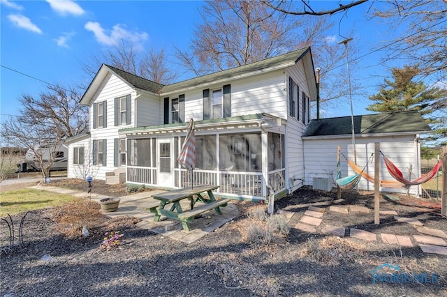 10243 S Dixie Hwy, Portage, OH 43451 - view of front of property with a sunroom and central air condition unit