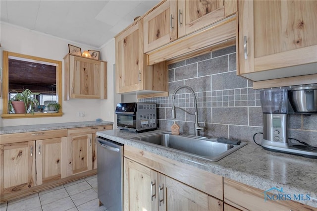 10243 S Dixie Hwy, Portage, OH 43451 - kitchen with dishwasher, a sink, tasteful backsplash, and light brown cabinetry