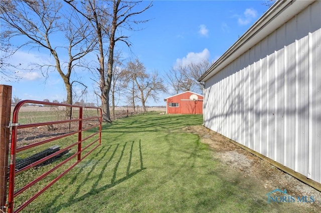 10243 S Dixie Hwy, Portage, OH 43451 - view of yard featuring a gate, fence, and a rural view