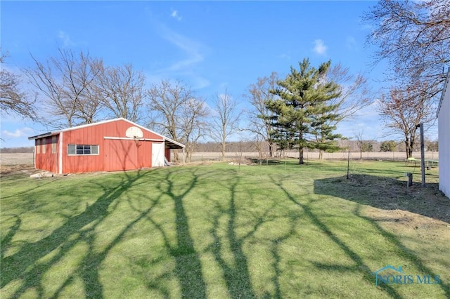 10243 S Dixie Hwy, Portage, OH 43451 - view of yard featuring an outbuilding, fence, and an outdoor structure