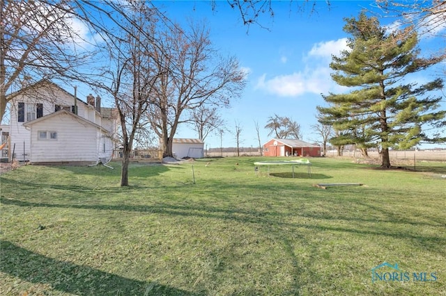 10243 S Dixie Hwy, Portage, OH 43451 - view of yard with fence, an outdoor structure, and a pole building