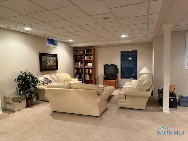 living area featuring a paneled ceiling, recessed lighting, baseboards, and light carpet