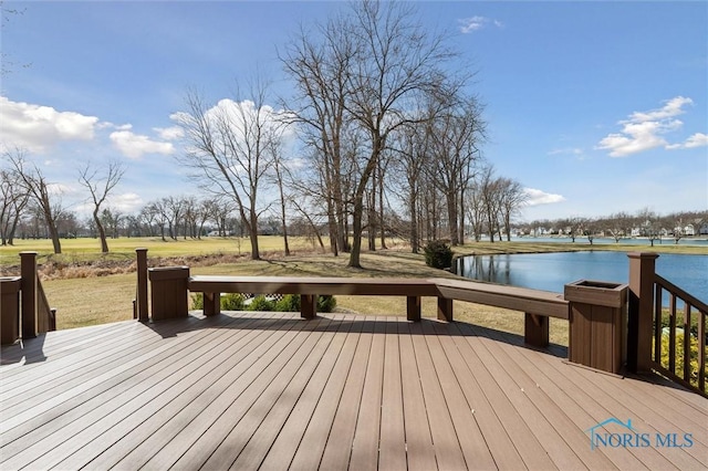 wooden terrace with a water view