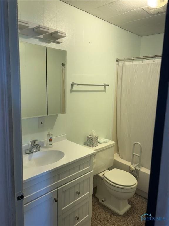 full bath with shower / bathtub combination with curtain, toilet, and vanity