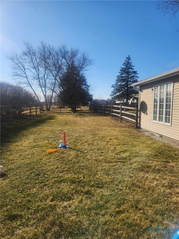 view of yard with fence