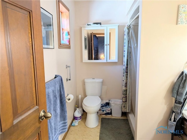 bathroom featuring toilet