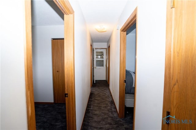 hall with carpet floors