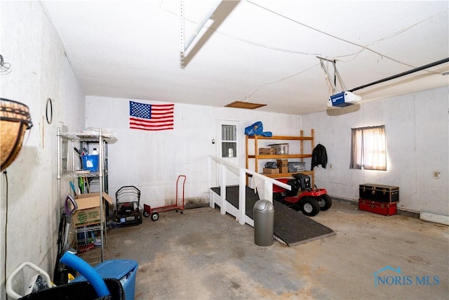 garage featuring a garage door opener
