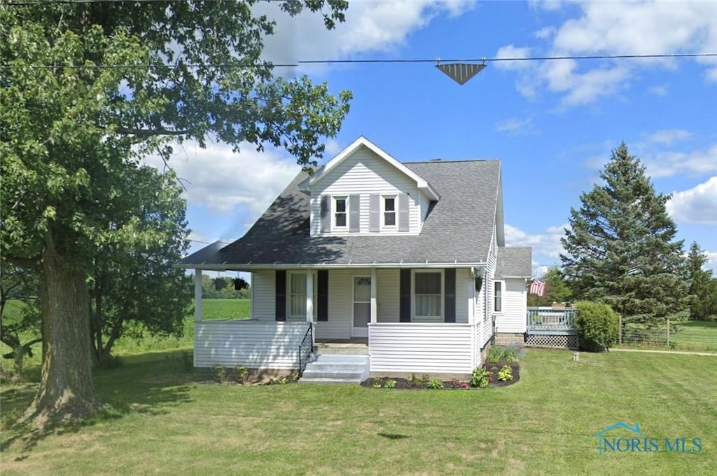 view of front of home featuring a porch and a front yard