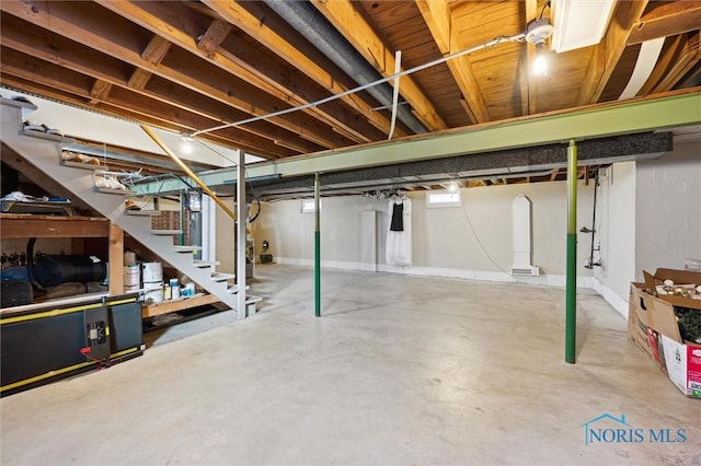 basement featuring stairway