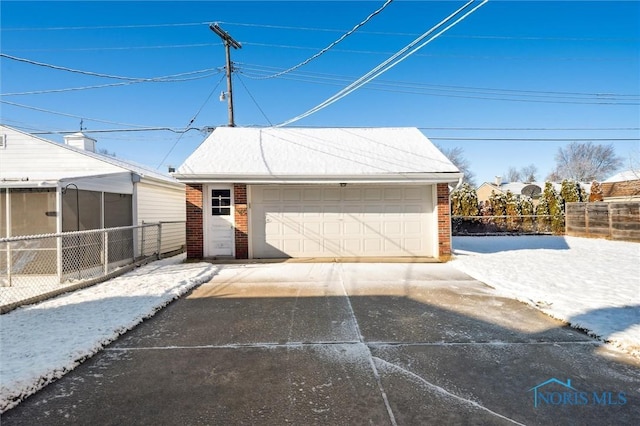 detached garage with fence