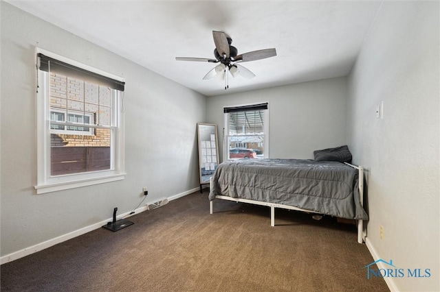 bedroom with a ceiling fan, visible vents, carpet, and baseboards