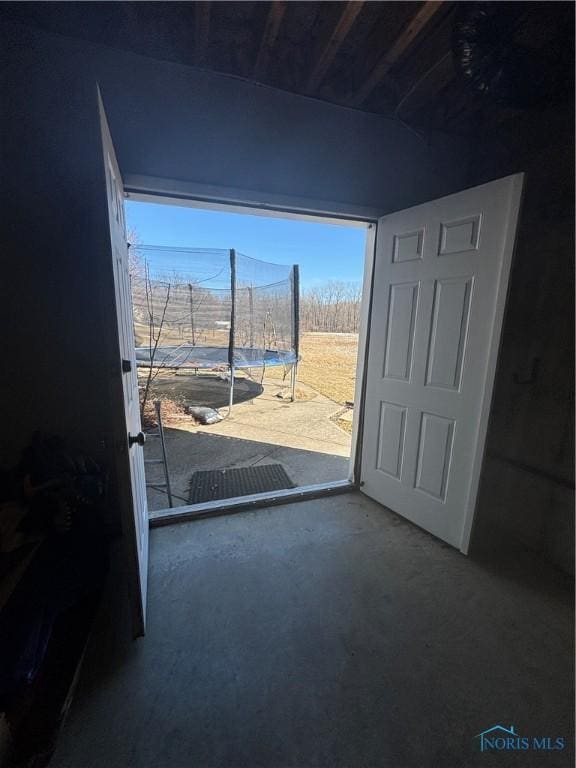 interior space featuring concrete floors