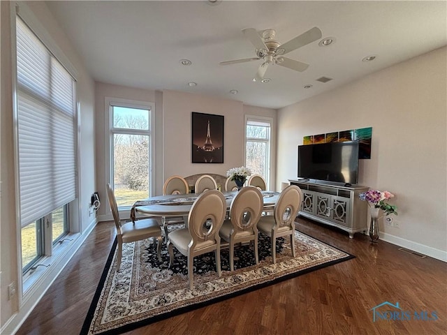 dining space with a ceiling fan, visible vents, wood finished floors, baseboards, and recessed lighting