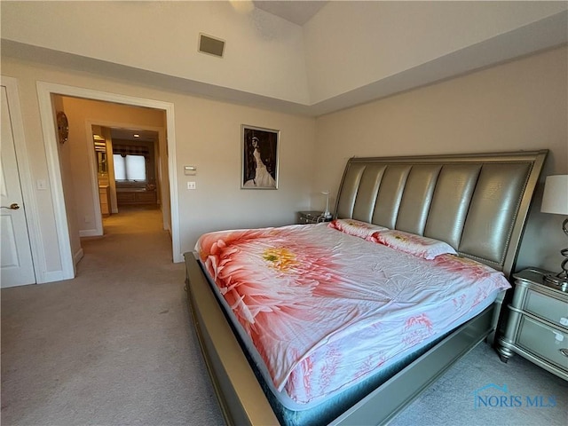 bedroom featuring visible vents, carpet floors, and baseboards