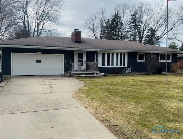 ranch-style home with a shingled roof, a front lawn, concrete driveway, a chimney, and a garage