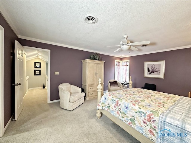 bedroom with visible vents, light carpet, a ceiling fan, a textured ceiling, and baseboards