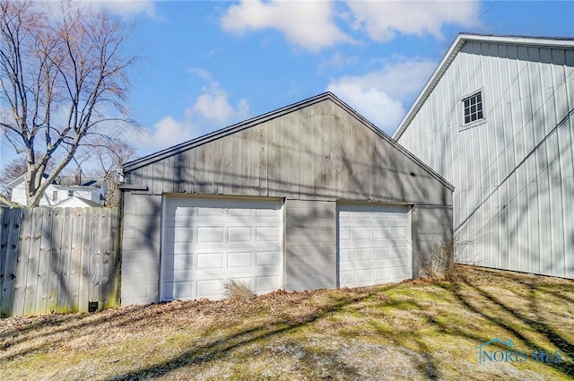 detached garage with fence