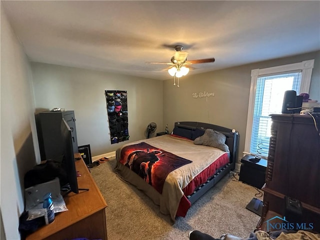 bedroom featuring carpet and ceiling fan