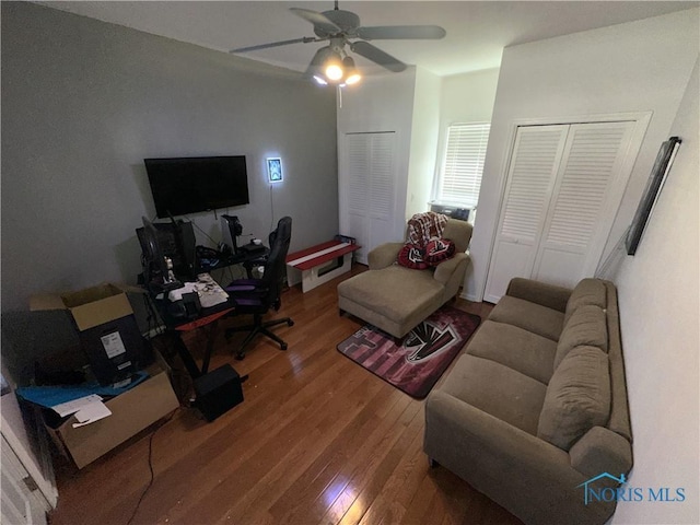 office space featuring ceiling fan and wood finished floors