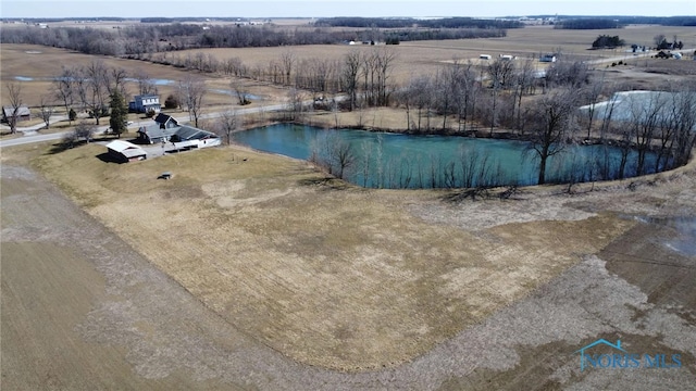 bird's eye view featuring a water view and a rural view