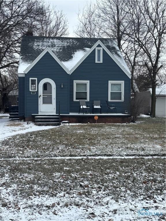 bungalow-style home with entry steps