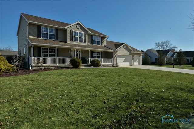 traditional-style house featuring a garage, a front lawn, a porch, and driveway