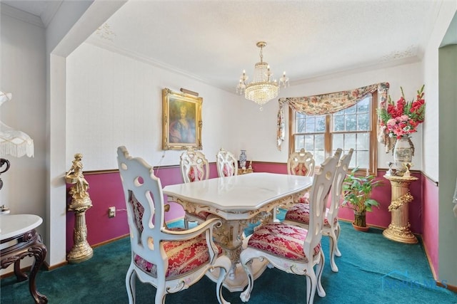 carpeted dining area with baseboards, an inviting chandelier, and ornamental molding