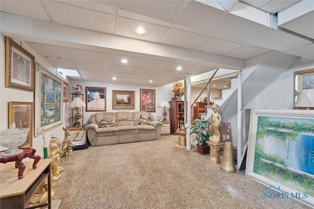 unfurnished living room with stairway, recessed lighting, carpet, and a drop ceiling