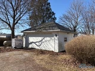 garage featuring driveway