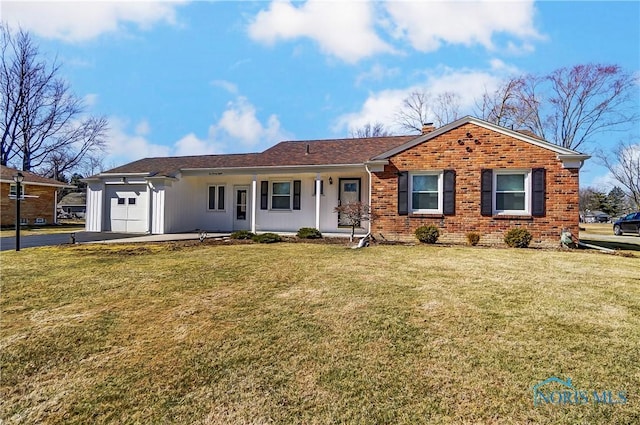 single story home featuring a porch, a chimney, a front lawn, a garage, and brick siding