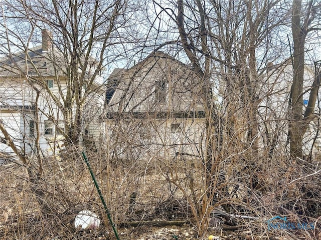 exterior space featuring a chimney