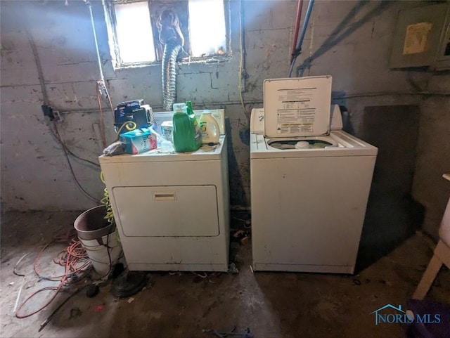 laundry area with laundry area and separate washer and dryer