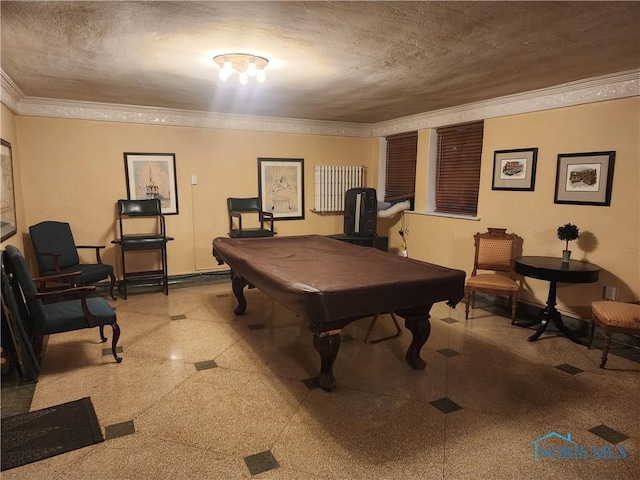 game room with pool table, a textured ceiling, baseboards, and ornamental molding