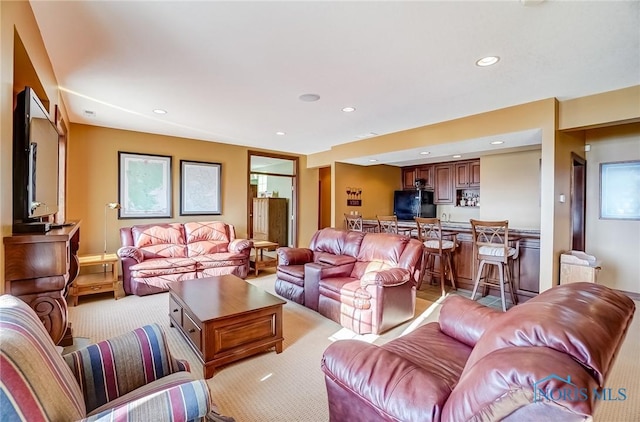 living room featuring recessed lighting