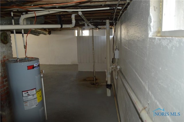 basement featuring water heater