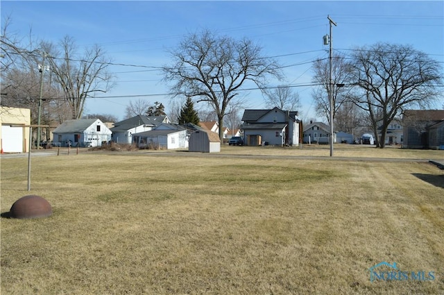 view of yard with a residential view