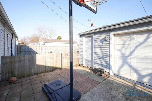 view of patio / terrace featuring area for grilling and fence