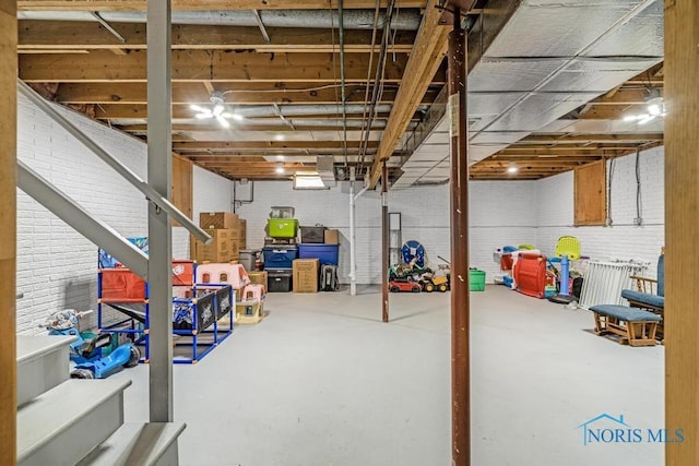 unfinished basement with brick wall