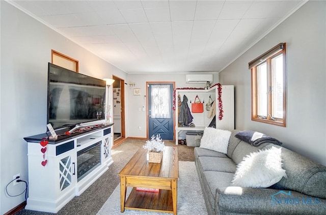 carpeted living room featuring baseboards, an AC wall unit, and ornamental molding