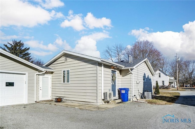 view of property exterior with ac unit