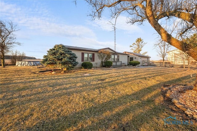 view of front of home with a front lawn