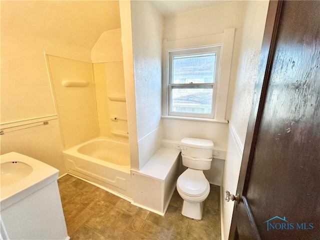 full bath featuring vanity, toilet, and tub / shower combination